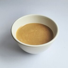 Karamelizuota lazdyno riešutų pasta 50% (500 gr.)